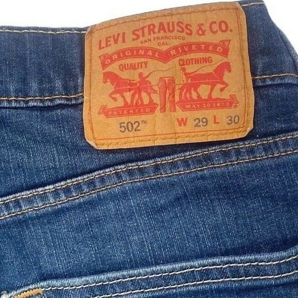 Levis Mens Jeans Size 29x27 Taper 502 Medium Wash Denim Zipper Fly Blue Pants - Picture 2 of 7